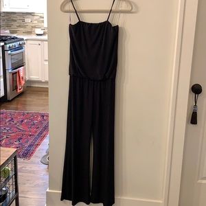 Black jumpsuit with spaghetti straps.